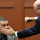 Prosecutor Bernie de la Rionda (R) demonstrates a scenario while questioning Chris Serino (Joe Burbank/Getty Images)